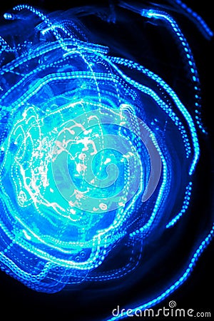 Swirl trail effect, circles with blue light isolated on black background. Decoration, Wallpaper. Stock Photo