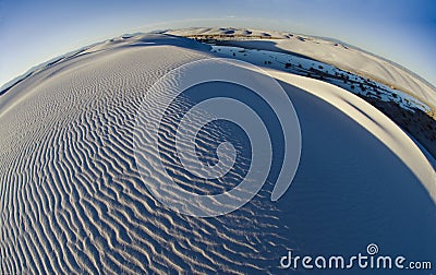 Swirling ridges and textured patterns of sand accentuate a more global perspective of White Sands National Monument. Stock Photo