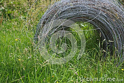 Swirls of metal wires used for farm or garden fencing Stock Photo