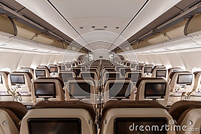 Swiss Airbus A340-300 airplane Economy Class cabin Zurich Airport in Switzerland Editorial Stock Photo