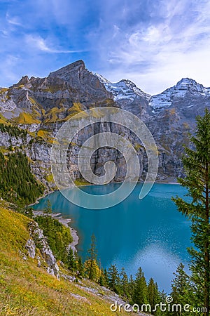 Swiss Alps, Kandersteg, Lake Oeschinensee, Bernese Oberland, Europe. A scenic depiction of a popular tourist attraction. Stock Photo