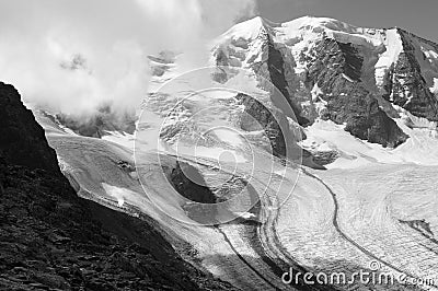 Swiss alps: Piz PalÃ¼ peak and melting glaciers due to global clima change Editorial Stock Photo