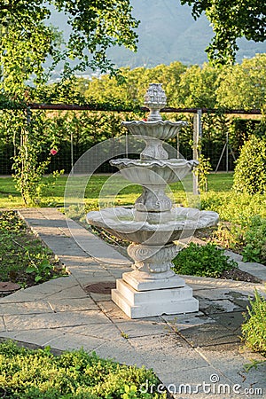 Swiss classic garden fountain decoration Stock Photo