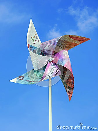 Swiss Frank money toy windmill Stock Photo