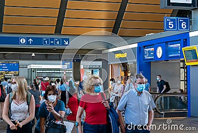 Swiss government regulations require travellers to wear face masks when using public transport Editorial Stock Photo