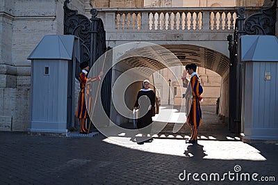 Swiss guards greeting nun Editorial Stock Photo