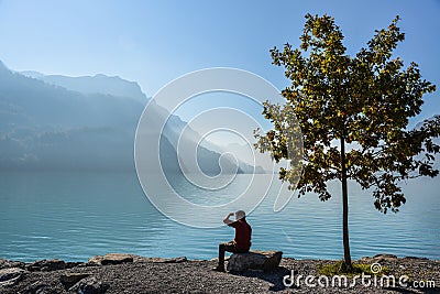 Swiss lake at sunset in Brienz, Switzerland Editorial Stock Photo