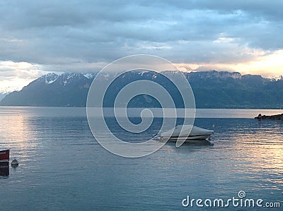 Swiss Lake sunset over mountains Editorial Stock Photo