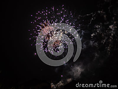 Swiss National Day colorful fireworks in the Swiss mountains near Lenzerheide - 1 Stock Photo