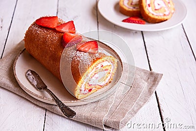 Swiss roll with strawberries and cream, homemde dessert Stock Photo