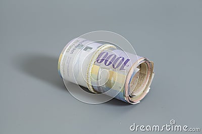 Swiss thousand francs in a roll Stock Photo