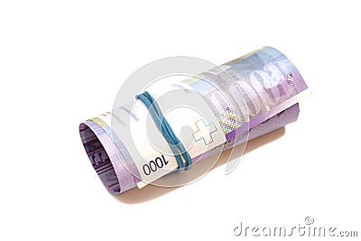 Swiss thousand francs in a roll Stock Photo