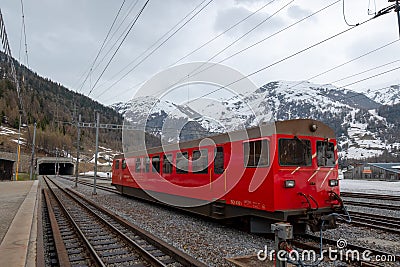 Swiss train goes to the mountain tunnel Editorial Stock Photo