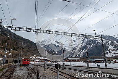 Swiss train goes to the mountain tunnel Editorial Stock Photo