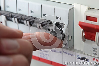 Switching an MCB & x28;Micro Circuit Breaker& x29; on a UK domestic electr Stock Photo