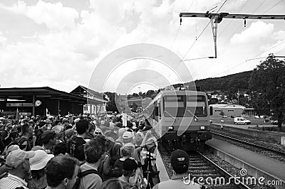 Switzerland: Anti nuclear power protesters entering public train Editorial Stock Photo