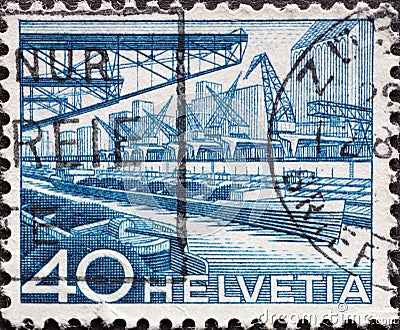 Switzerland - Circa 1949 : a postage stamp printed in the swiss showing the Rhine port in Basel Editorial Stock Photo