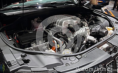 Switzerland; Geneva; March 11, 2019; A close up of Jeep Grand Cherokee engine; The 89th International Motor Show in Geneva from Editorial Stock Photo