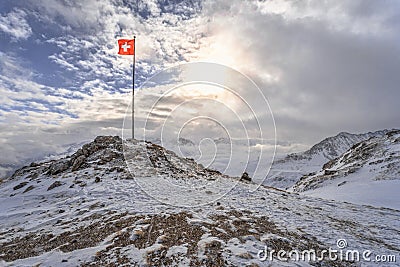 Swiss flag at snow Editorial Stock Photo