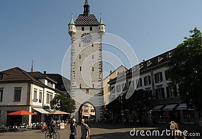 Switzerland: The historic clock tower in Baden City in canton Aargau Editorial Stock Photo