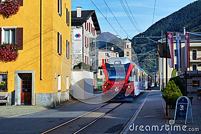 Bernina Express train in the mountains of Switzerlandm Editorial Stock Photo