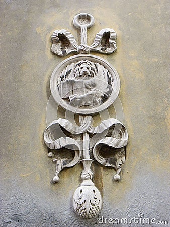 Sword and lion sculpture on wall in Venice Stock Photo