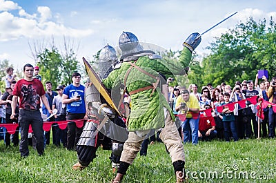 The swordfight heavily armed medieval warriors Editorial Stock Photo