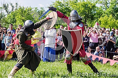 The swordfight heavily armed medieval warriors Editorial Stock Photo