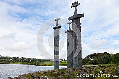 Swords in Rock Stock Photo