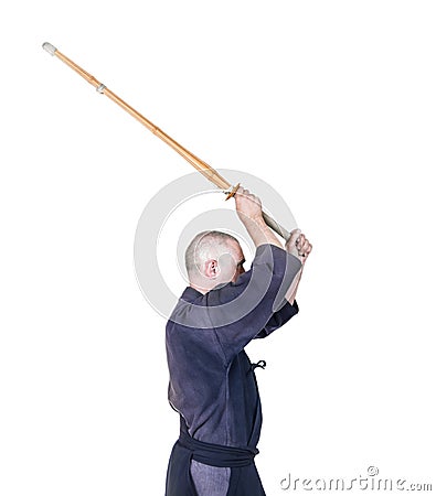 Swordsman in attacking position with bamboo sword `sinai` for J Stock Photo