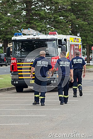 Fire and Rescue New South Wales crew returning to their fire truck Editorial Stock Photo