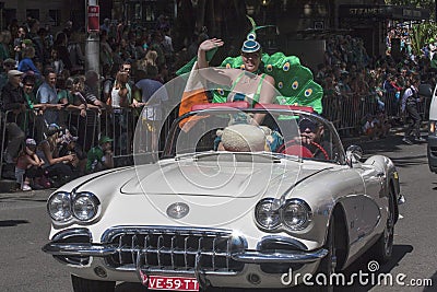 SYDNEY, AUSTRALIA - Mar 17TH: Woman in vintage Chevrolet Corvette in the St Patrick`s Day parade on March 17th 2013. Australia Editorial Stock Photo