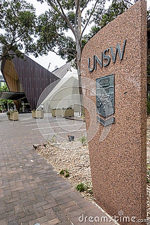 Vertical marble slab with UNSW script and emblem at the Chancellery UNSW Editorial Stock Photo