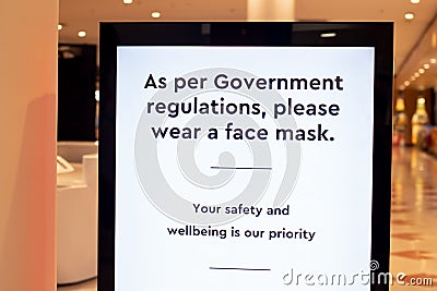 Wearing face masks in shopping centres are compulsory in some australian states. As per Government Stock Photo