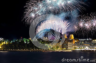 Sydney Harbour Bridge New Years Eve fireworks, colourful fire works lighting the night skies with vivid multi colours Editorial Stock Photo