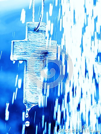 Symbol of Baptism - Cross under water shower Stock Photo