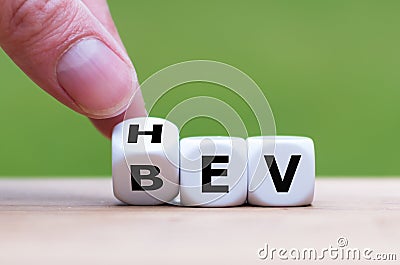 Symbol for choosing a Hybrid Electric Vehicle HEV or a Battery Electric Vehicle BEV Stock Photo