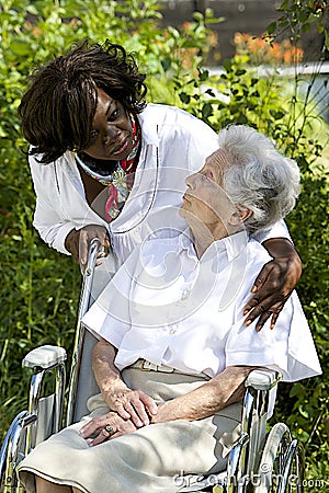 Symbol of comfort and support from a care giver to the Senior Stock Photo