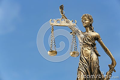 Symbol of fair treatment under law. Figure of Lady Justice against sky, closeup with space for text Stock Photo