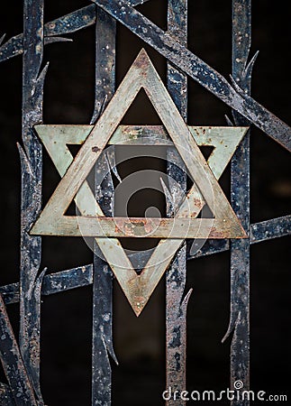 Symbol of the Jewish faith, the star of David hangs of gate Editorial Stock Photo