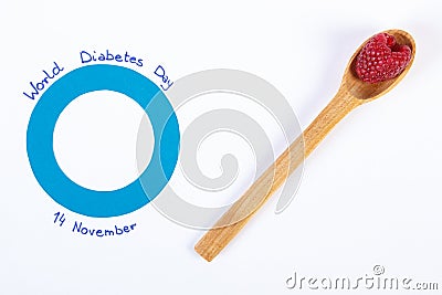 Symbol of world diabetes day and fresh raspberries on white background Stock Photo