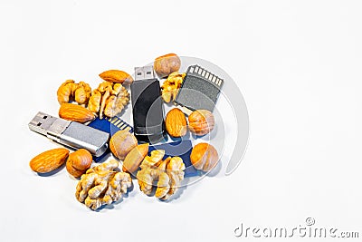 Symbolic composition of nuts and memory cards. Stock Photo