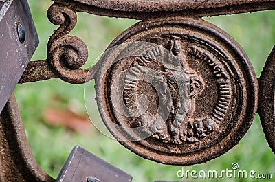 The symbolic icon of Bangkok in `An angel riding an elephant` Low relief artwork on old rusty metal surface. Editorial Stock Photo