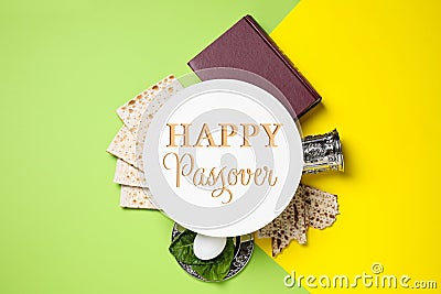 Symbolic Passover items and card on background, flat lay. Pesah celebration Stock Photo