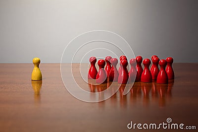 Symbolism wooden figures for exclusion racism mobbing hate Stock Photo