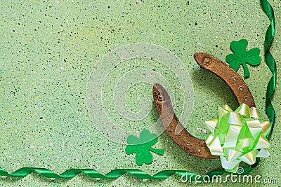 Symbols of St. Patrick's Day: horseshoe, shamrock clover, green Stock Photo