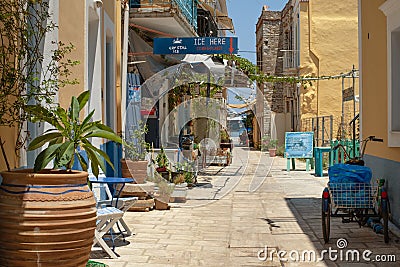 Symi Island, Greece - June 27, 2019: View of bright blue and yellow streets of Symi Island, Greece Editorial Stock Photo