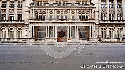 Symmetric view Old 19th century building in london on empty road and no sky and no people Editorial Stock Photo