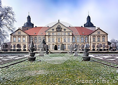 Symmetric view of winterly Hundisburg Castle with palace grounds in Germany Editorial Stock Photo