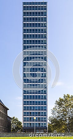 Symmetrical front shoot of an office building with blue sky from Stock Photo